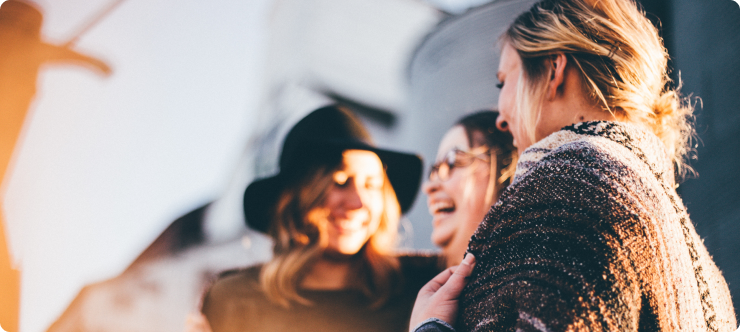 Three girls laughing